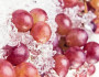ripe red grapes on a plate with ice